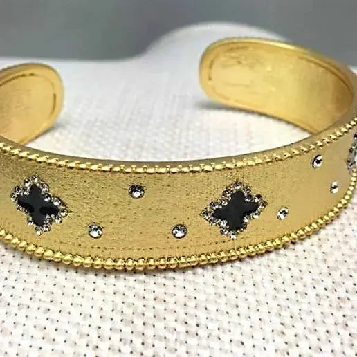 gold bangle bracelet black flower