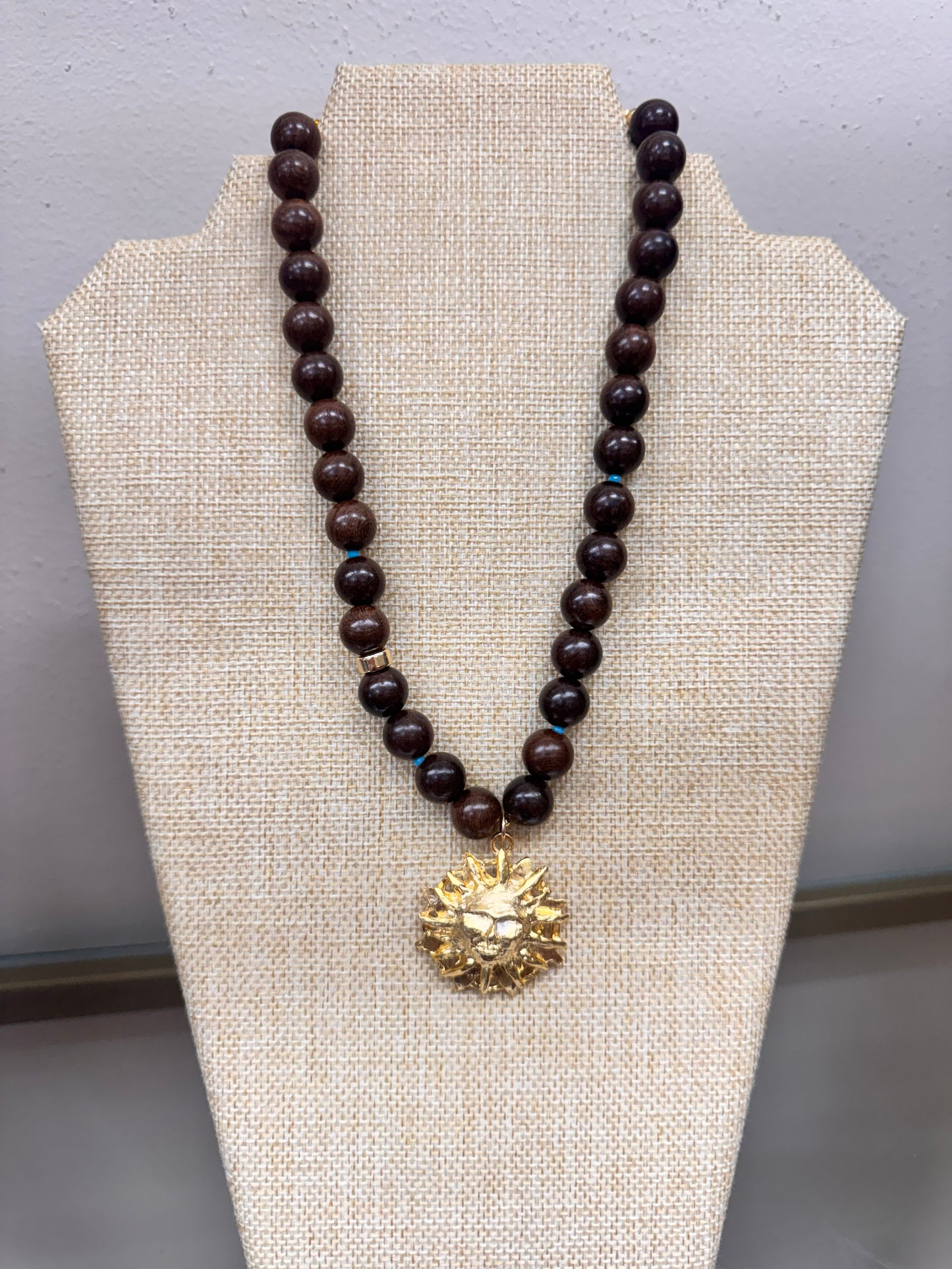 knotty bling brown with large sun medallion necklace